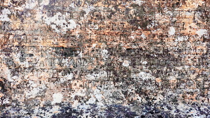 Ancient Inscription Weathered Wall Close-up Multicolor Textured Historic Pattern