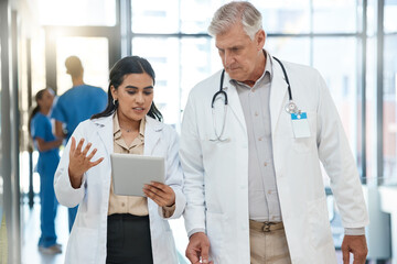 People, doctors and talk with tablet in hospital of healthcare schedule, planning surgery and...