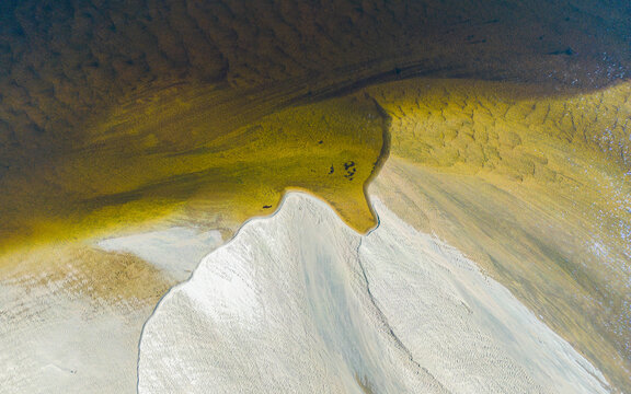 Aerial view of a beautiful sandbank and river in a tranquil landscape, Karasjohka, Norway.