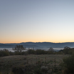 Sunrise in Bansko in Bulgaria with mist in the horisont