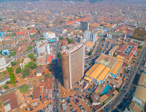 Aerial view of bustling downtown Ibadan with modern skyscrapers and busy streets, Oyo State, Nigeria.