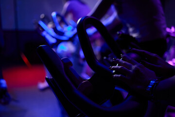 Musical instrument enthusiasts enjoy playing guitars in a gym