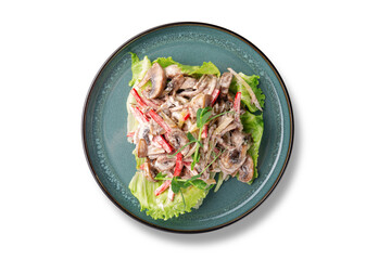 Russian cuisine. Salad with mushrooms, beef and sweet red pepper on white background