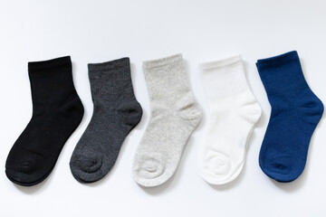 5 Pairs of Baby Socks Blue, Black, Grey, White on White Background