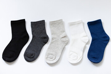 5 Pairs of Baby Socks Blue, Black, Grey, White on White Background