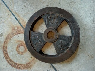 A 20 kg weight plate on ground, GYM equipment