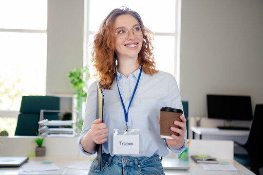 Photo of pretty young girl drink coffee trainee look empty space wear formalwear business adviser coworking successful nice light office