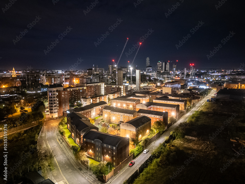 Wall mural liverpool city centre showing residential areas and construction at night