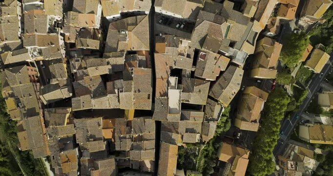 Aerial view of picturesque medieval rooftops and historic architecture in the charming town of Orte, Italy.