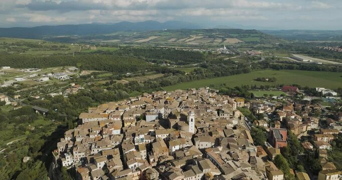 Aerial view of the picturesque medieval town with historic architecture and scenic countryside, Orte, Italy.