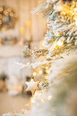 Beautifully illuminated Christmas decoration with sparkling lights, Christmas trees, stars, teddy bears and presents.	
