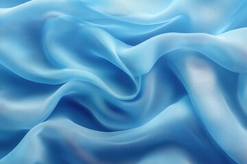 Obraz premium Blue transparent chiffon fabric is flowing down forming soft smooth waves