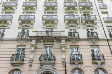 Cityscape with large ancien hotel with balconies n the historic center of Vichy in France