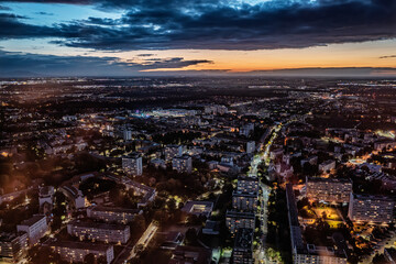 Fototapeta premium Cityscape Aerial View at Dusk With Illuminated Streets, Wroclaw Poland