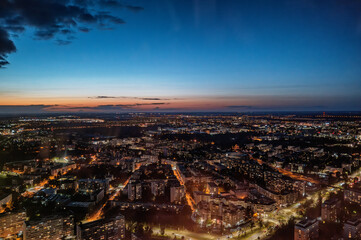 Obraz premium Cityscape Aerial View at Dusk With Illuminated Streets, Wroclaw Poland