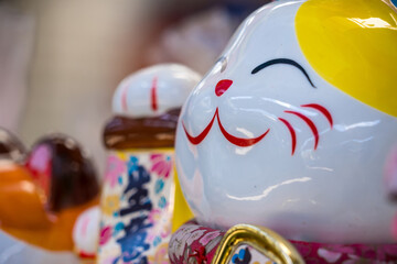 Nonthaburii, Thailand - June, 24, 2024 : Lucky Charms: Maneki-neko Figurines for Prosperity at Nonthaburii, Thailand.