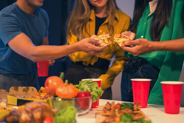 celebration successful deal with champagne and pizza in the workplace.