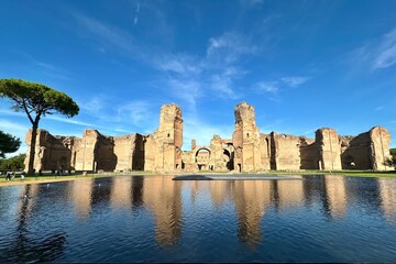 Rome baths of Caracalla seen mirrored into the water surface.