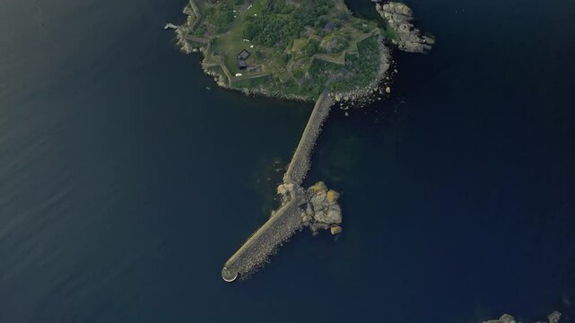Aerial view of karlshamn castle on a small island with a serene pier, karlshamn citadel, sweden.