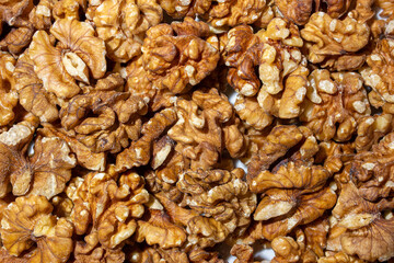 Scattered Shelled Walnuts. Background from Walnut. Natural High-Calorie Snacks