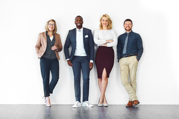 Teamwork, about us and smile with portrait of business people in studio for partnership, diversity...