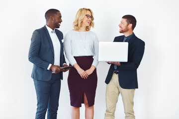 Business people, laptop and presentation with meeting, thinking and studio wall or creative agency for project. Teamwork, support and diversity for planning and website discussion on white background