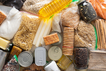 Canned goods, cereals, and pasta stored for quarantine and isolation, ensuring long-term survival and food security at home, survival during military operations, the concept of stay at home