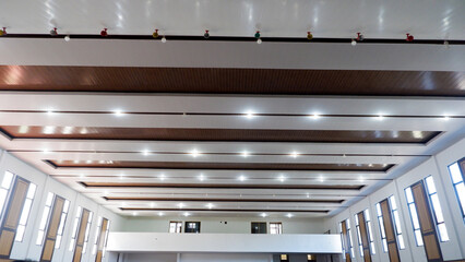 Interior Of A Multipurpose Building Or Hall With White And Brown Color Scheme