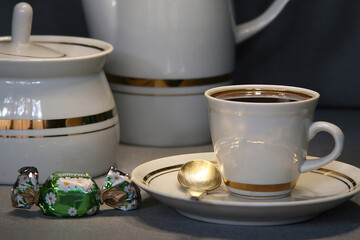.Coffee in a white porcelain cup close-up