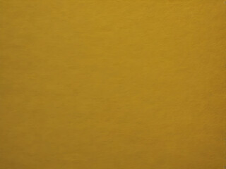 A rich mustard yellow background with minimal grain texture, creating a warm, nostalgic mood