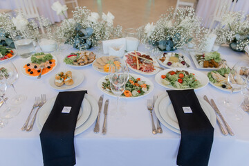 food and drinks on a festive table in a restaurant on a wedding birthday