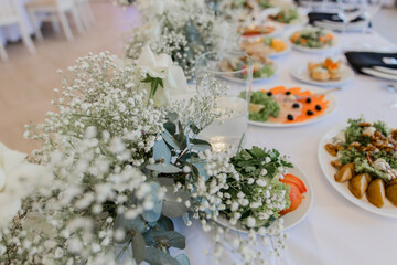 food and drinks on a festive table in a restaurant on a wedding birthday