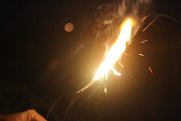 Close-up shot of fireworks in the dark