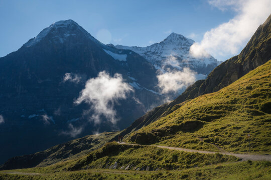 View of breathtaking alpine landscape with rugged mountains and scenic clouds, Wengen, Switzerland.