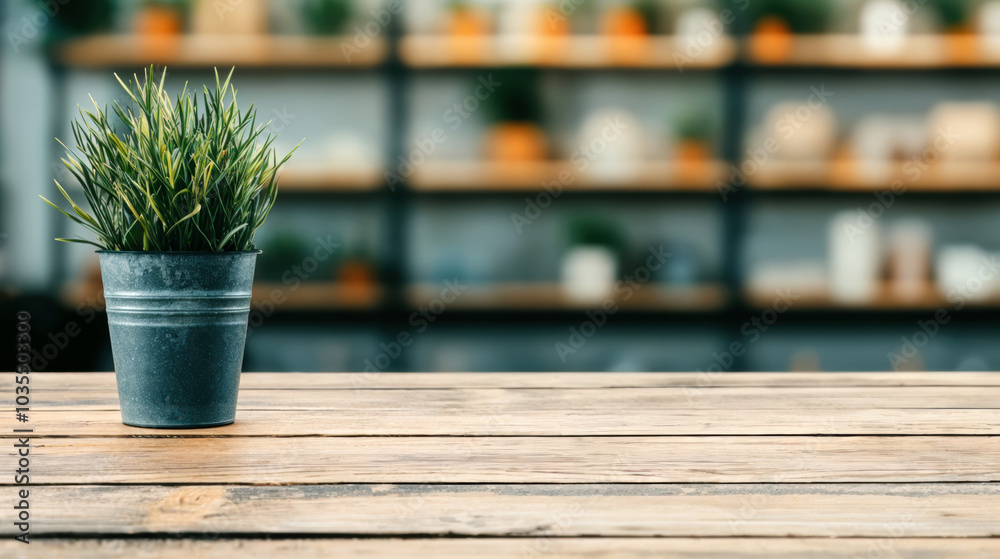 Aufkleber empty wooden table surface with a leaves pot in front of blurred background, ideal for product place