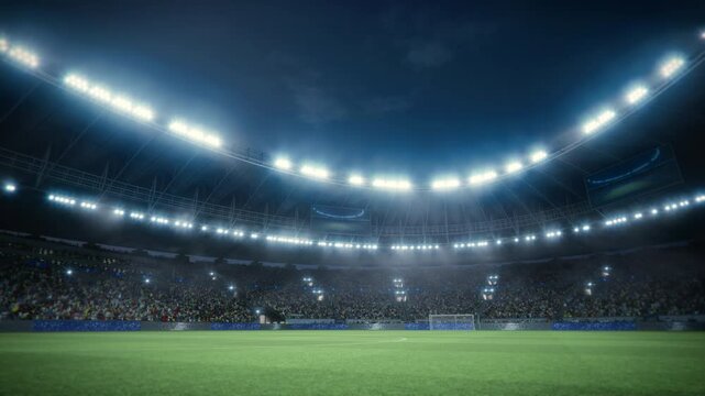 Aerial View of a Soccer Stadium at Night. the Field, Goalposts, and a Large Crowd of Fans Are Visible. Slowly Moving Tracking Shot across Field