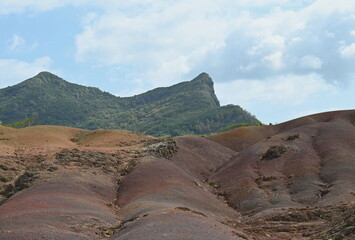Mauritius Chamarel colourful sand Seven Coloured Earth Geopark on a nice day.