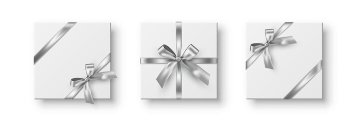 Silver ribbons with bow set. Gift wrapping decoration on white background. Collection of present box decoration. Realistic 3d vector design elements.