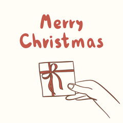 Christmas greeting card with hand holding a gift