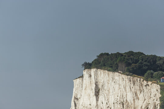 View of the majestic white cliffs against a tranquil blue sky, St Margaret's at Cliffe, United Kingdom.