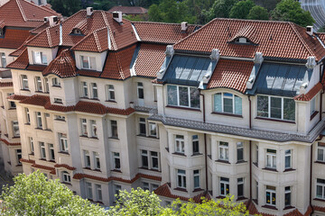 Obraz premium Experience the stunning beauty of European architecture, complete with classic red roofs.