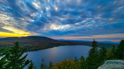 Beautiful colorful sunset over the mountains in autumn, fall foliage 