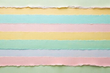 Aerial view of torn paper with pastel stripe