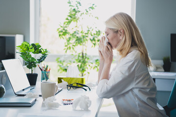 Photo of manager analytic blonde lady sick wearing formal white shirt and eyeglasses at office...