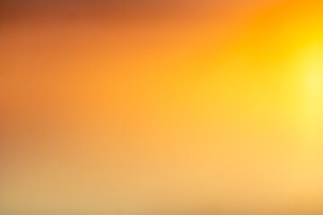 Obraz premium Luxury of light yellow and gold blurred gradient background has a little abstract light. sunlight shadow blurred