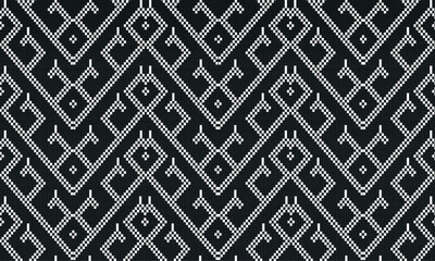 A intricate geometric pattern in a stark black and white color scheme. The pattern is composed of interlocking diamond shapes that are further enhanced by zigzag lines running through them.