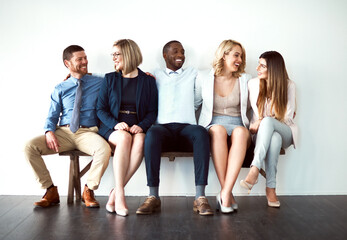 Obraz premium Smile, business and people in row at office for job interview, recruitment and hiring on white background. Employees, candidates and human resources for career opportunity, development and vacancy