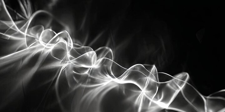 A black and white image of smoke with a white line in the middle
