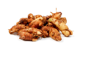 top view traditional Aromatic Ginger, Sand Ginger isolated on white backround. Herbs and spices. Tropical plant primarily used in Indonesian cuisine and traditional medicine , knobby ginger roots wit