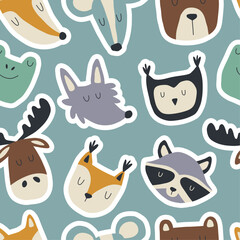 Hand drawn seamless pattern with forest animals. Repetitive texture for textile, fabric and scrapbooking design. Faces of wild animals, fox, wolf, squirrel, moose and others.